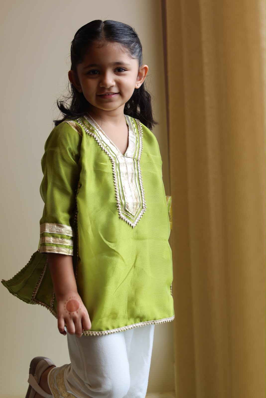 Green kurta with gold trim